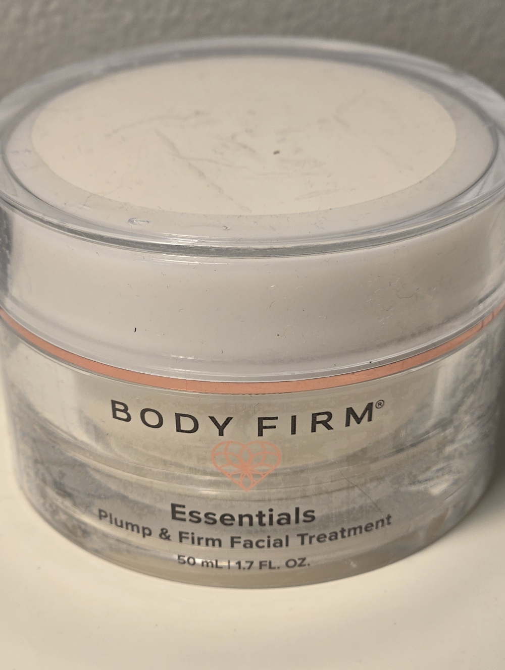 NWT body firm essentials plump and firm facial treatment. 1.7oz